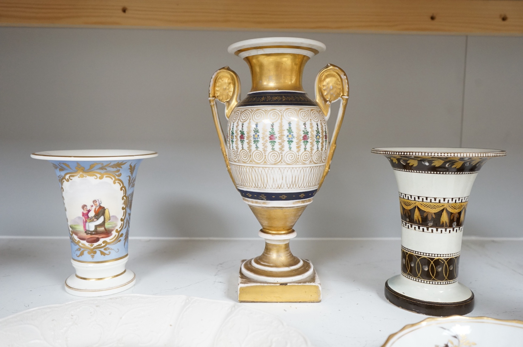 An 18th century salt glazed stoneware dish, another dish and three various vases, tallest 24.5cm. Condition - varies